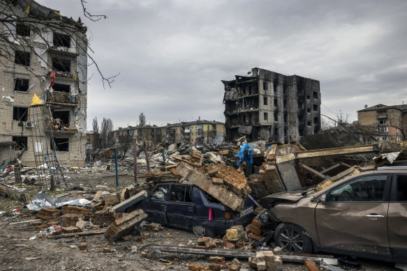 Cars are crushed under the rubble in Borodyanka, Ukraine. Borodyanka was among the first places to be hit by Russian airstrikes after the invasion.