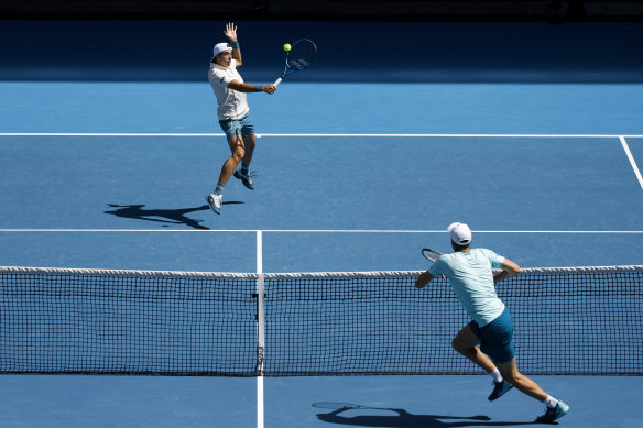 Arthur Cazaux plays a backhand against Hubert Hurkacz.