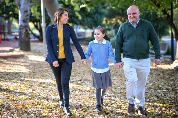 Liberal MP Jason Wood, wife Judy Cheung-Wood and daughter Jasmine celebrate his election win. 24 May 2022. 