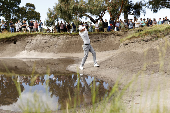 Cameron Smith plays a shot from the bunker at the first hole at Victoria Golf Club during the first round of the Australian Open.