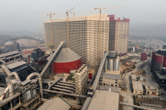 The 26-storey building on the outskirts of Ezhou, China is being hailed as the world’s biggest free-standing pig farm with a second identical hog high-rise opening soon.