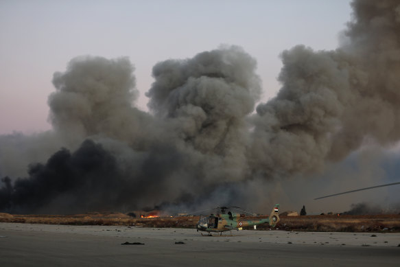 Smoke rises in the aftermath of suspected IDF strikes near a Damascus air base on Sunday.