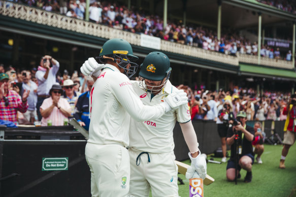 David Warner hugs opening partner Usman Khawaja before going out for his final Test innings at the SCG.  
