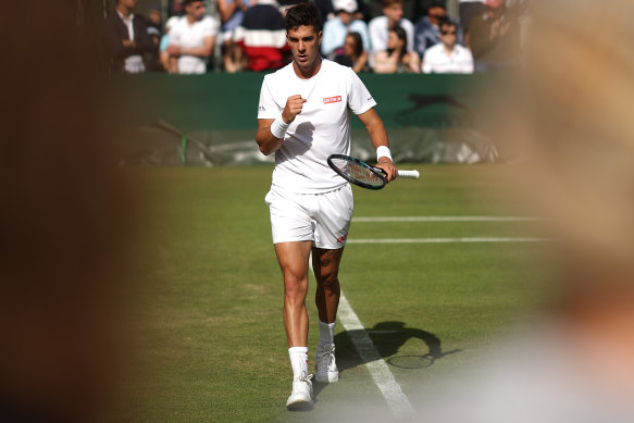 Thanasi Kokkinakis celebrates during his first-round win.