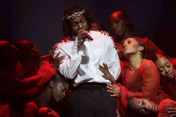 Kendrick Lamar performing at the Glastonbury Festival .