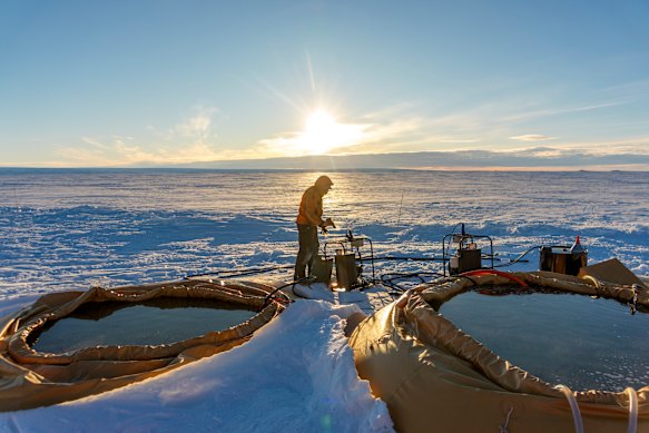 Engineer Paul Anker checks on the supply of hot water for a drilling operation at Thwaites Glacier in Antarctica in January 2026.