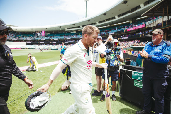 David Warner walks off one last time.