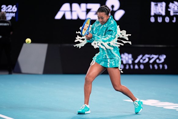 Osaka changed her look for her on-court warm up.