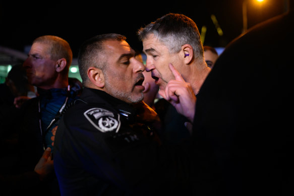 Police officers clash with protesters during a protest calling for the release of hostages and against the government and Israeli Prime Minister Benjamin Netanyahu in Tel Aviv, Israel. 