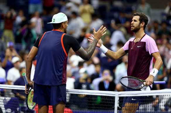 Karen Khachanov and Nick Kyrgios shake hands after the quarter-final.