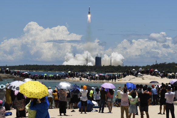 A rocket carrying China’s Tianwen-1 Mars probe lifts of in July 2020.
