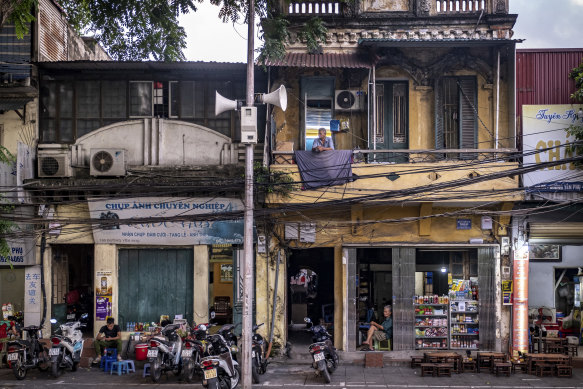 Loudspeakers in front of shops in Hoan Kiem District in Hanoi.