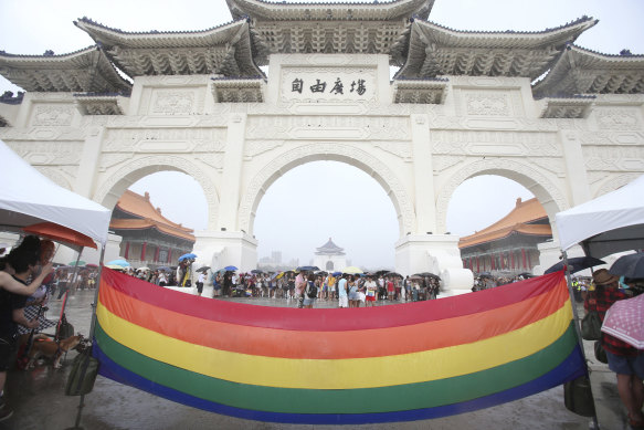A rainbow flag at a pride march in Taiwan last month, the only place in Asia to legally recognise same-sex marriage.