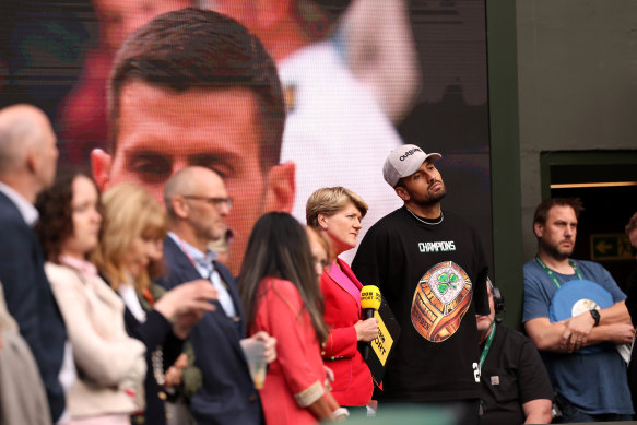 Kyrgios courtside following Novak Djokovic’s semi-final win.