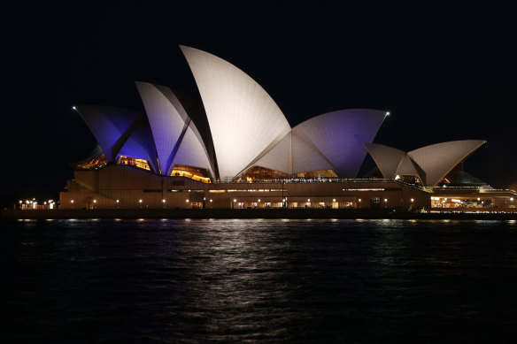 The blue and white colours of the Israeli flag projected onto the Opera House on October 9.