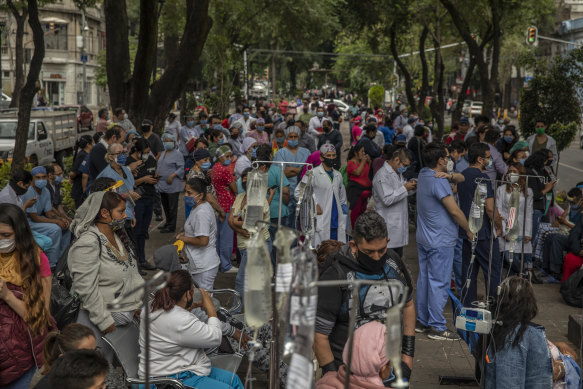 Medical staff and patients gathered outside Alvaro Obregon Hospital in Mexico City during the earthquake.
