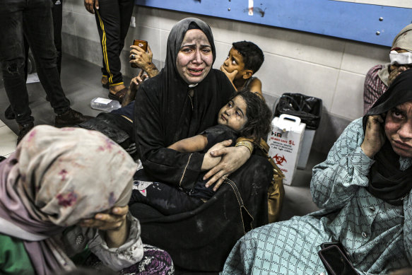 Wounded Palestinians in the Al Shifa hospital in Gaza City. Hundreds of civilians wounded in the Al Ahli Arab Hospital blast were rushed there.