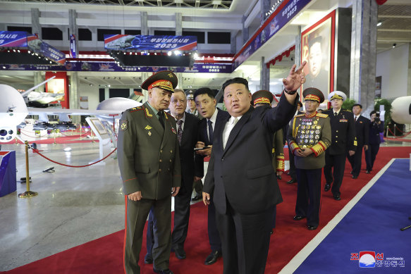 Kim Jong-un and Sergei Shoigu visit an exhibition of armed equipment on the 70th anniversary of the Korean War armistice in July.