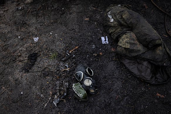 A destroyed mask and other gear left at the site where as many as nine Russian tanks and armored vehicles were destroyed on a forest road outside Dmytrivka, Ukraine, west of Kyiv .