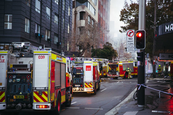 Firefighters, police and emergency services respond to a large building fire on Randle Street, Surry Hills.