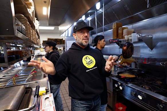 Steven Marks in the kitchen of Guzman y Gomez in Schaumburg, Illinois, on March 5, 2026, before all U.S. stores closed.