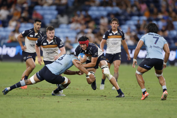 Lachlan Shaw of the Brumbies runs with the ball