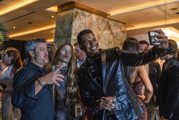 Guests take a selfie at the Power Broker Awards afterparty.