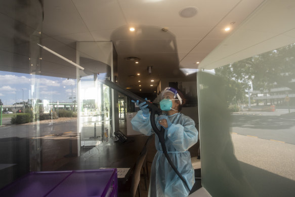Cleaners disinfecting a hotel quarantine site in Melbourne, February 2021.