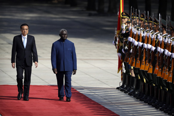 Chinese Premier Li Keqiang, left, and Solomon Islands Prime Minister Manasseh Sogavare in Beijing. 