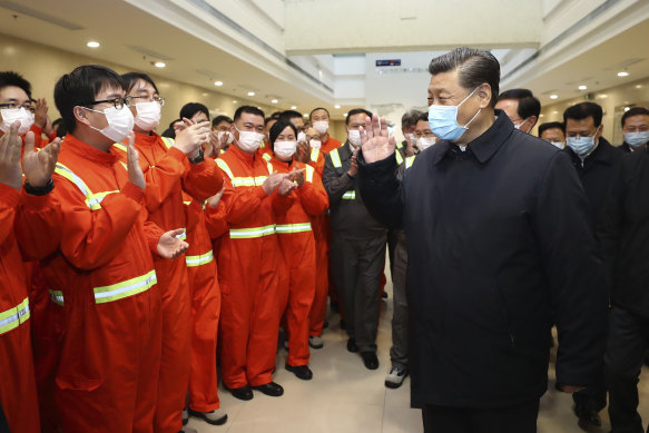 President Xi Jinping visits the Ningbo-Zhoushan Port in eastern China. Both the government and central bank are moving furiously to refloat the economy.