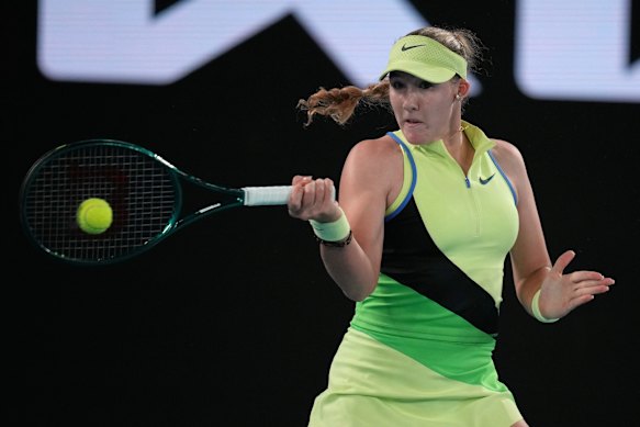 Mirra Andreeva of Russia plays a forehand return to Elina Svitolina of Ukraine.