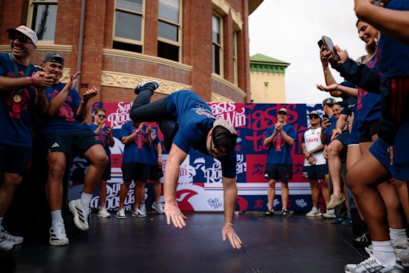 Sydney Roosters NRLW team head coach John Strange breaks on stage.