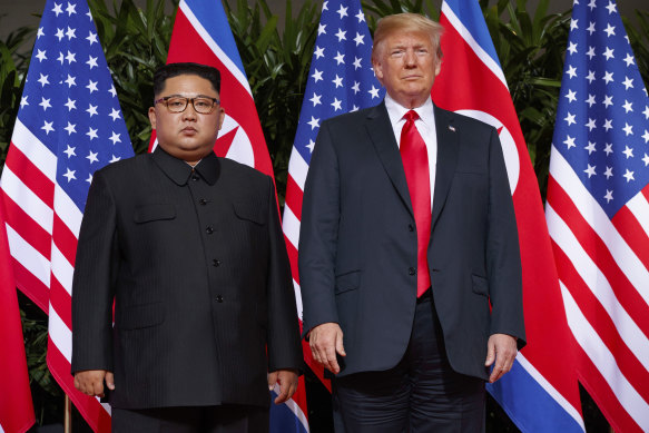 Paternal pride? North Korean leader Kim Jong-un, left, with Trump in 2018. Trump dubbed him “Little Rocket Man”.