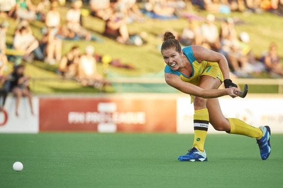 Georgina Morgan takes on Great Britain in a FIH Pro League match in Perth. Hockey Australia revealed on Friday the WA capital would remain the nation’s home of hockey.