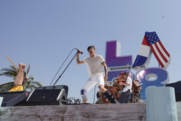 The Red Hot Chili Peppers perform in Los Angeles as part of the Olympic handover celebration.