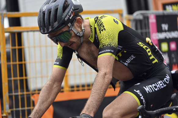 Simon Yates crossed the finish line with his shirt unzipped, suggesting he may have overheated.