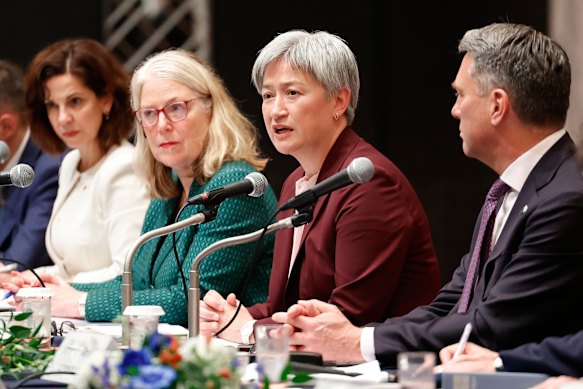 Foreign Minister Penny Wong with Defence Minister Richard Marles in Tokyo on Friday.