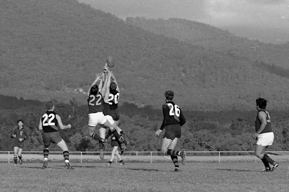 High-flying marks were what first drew director Angela How to Australian rules football.