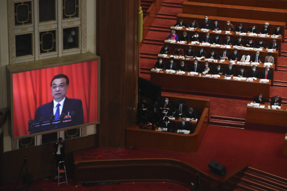 Chinese Premier Li Keqiang delivers the government work report during the opening session of China's National People's Congress. 