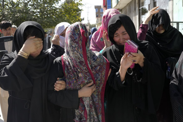 The family of a 19-year-old girl who was victim of a suicide bomber mourns, in Kabul, Afghanistan, on Friday, September 30.
