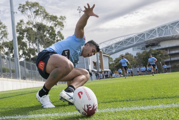 The Roosters teen stretches out at Blues training on Thursday.