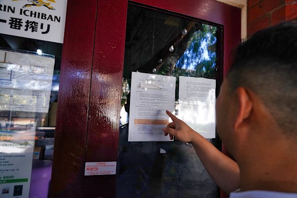 The eviction notices on the door of the Kappaya Japanese restaurant.