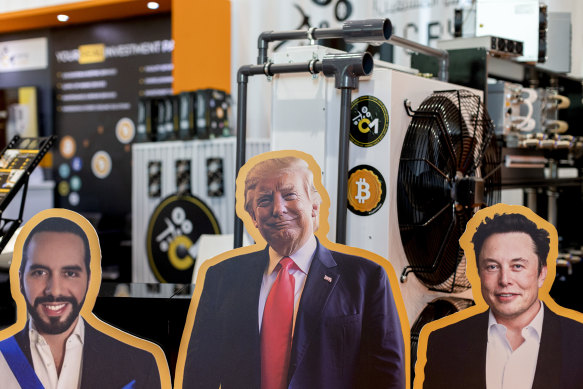 Cutouts of President Nayib Bukele of El Salvador, left, President-elect Donald Trump, center, and Elon Musk, at the Bitcoin MENA 2024 conference in Abu Dhabi, United Arab Emirates, 