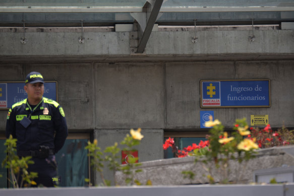 A police officer stands guard outside the attorney-general’s office on the day Nicolas Petro was arrested as part of an investigation into money laundering and illicit enrichment, on Saturday.