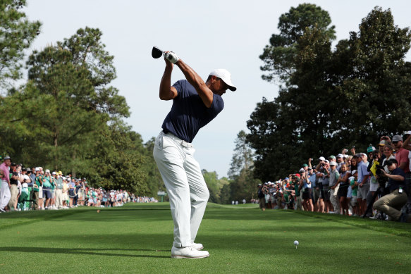 A bumper crowd watches Tiger Woods in practice ahead of the 2022 Masters Tournament.