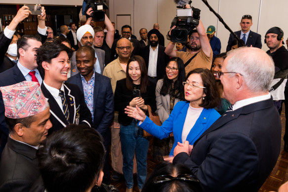 Gladys Liu (in blue) at an event in Chisholm with Prime Minister Scott Morrison last week.