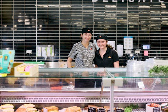 Indi and Lily working the deli counter at IGA Upper Kedron.