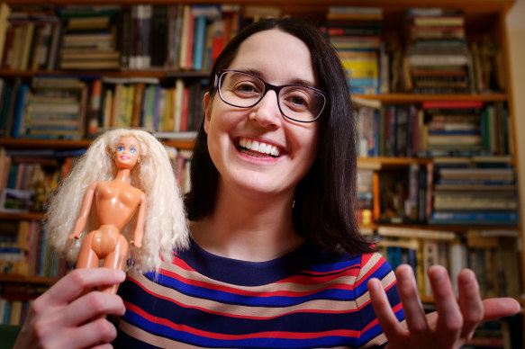 Dr Gemma Sharp with her childhood Barbie - she holds one of the dolls up in lectures to illustrate what is being pushed as the “ideal” appearance of female genitalia - “one smooth curve”.