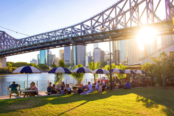 Umbrellas along the boardwalk at Howard Smith Wharves.