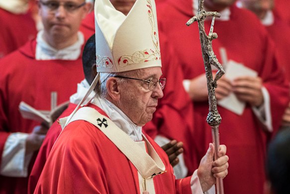 Pope Francis wearing his lambswool pallium around his shoulders. 
